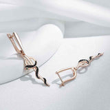 Rose Gold Snake Earrings